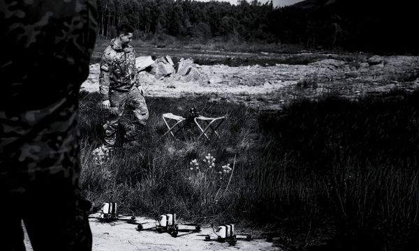Decorative image of soldier walking on a test range